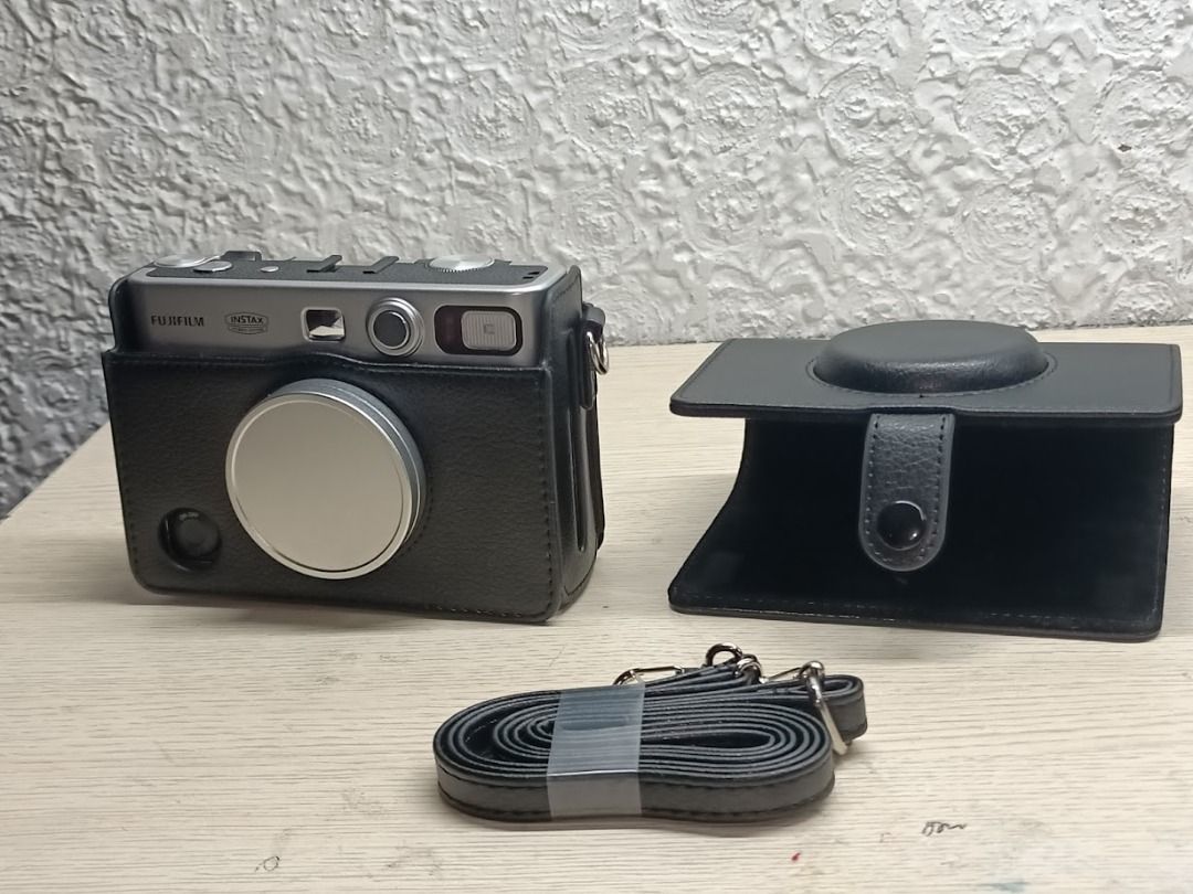 Instax Mini Evo black case magnetic cover flip (Category: Other Accessories) located in Malolos. Submitted by kairo5_ (Listing ID 1437628715, Image 2). Description: RFS: Accidentally bought two Price can be negotiated accepting Gcash only my experience with the case itself is very good, a hassle if you're gonna take pictures and the cover is just hanging... I suggest detached pag mag ppictures, attatched when kept away. Metal camera cover not inc