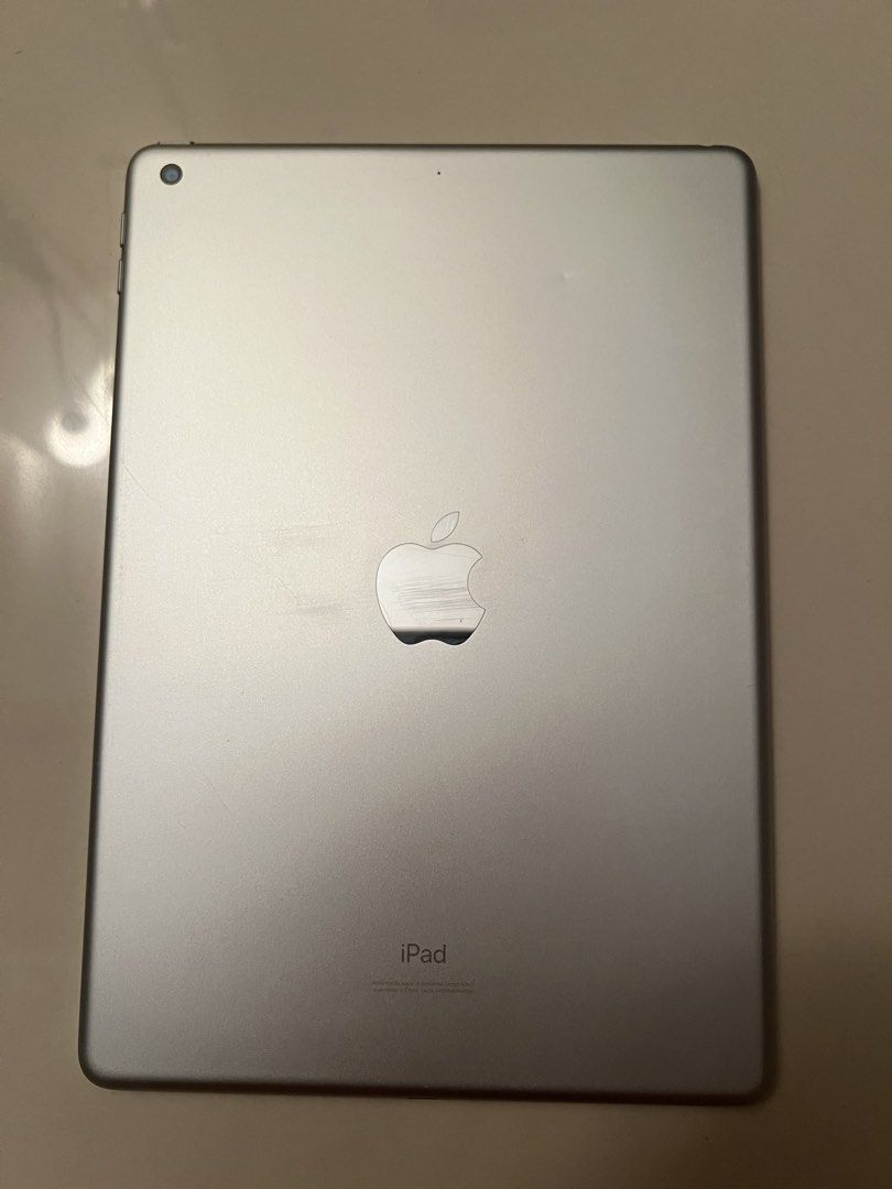 iPad (7th Generation) with Case and Bluetooth Keyboard/Mouse (Category: iPad) located in Manila. Submitted by sellingelly (Listing ID 1437581629, Image 2). Description: info: - wifi only - 32 gb - with scratches on apple logo - working buttons and charge port - working fingerprint and face id - no repair history inclusions: - removable case - bluetooth keyboard and mouse - used paper-like screen protector.