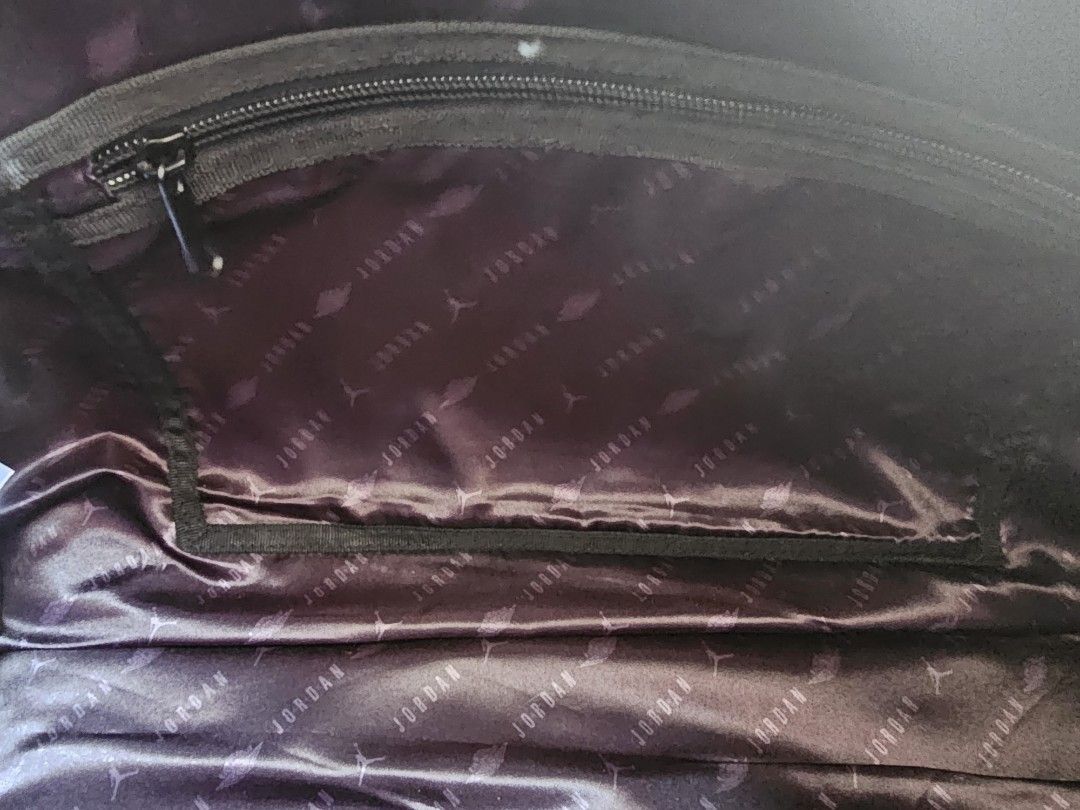 Jordan Duffle Bag (Category: Sling Bags) located in Manila. Submitted by cosmicfire-ef85 (Listing ID 1437619125, Image 3). Description: Synthetic leather construction Removable padded shoulder strap Shoe garage/ball carrier Dual zipper closure provides secure storage Jumpman luggage tag Dimensions: 9.75" (H) X 18" (W) X 8" (D) Capacity: 23L Brand : Jordan Only used twice RFS: Decluttering.