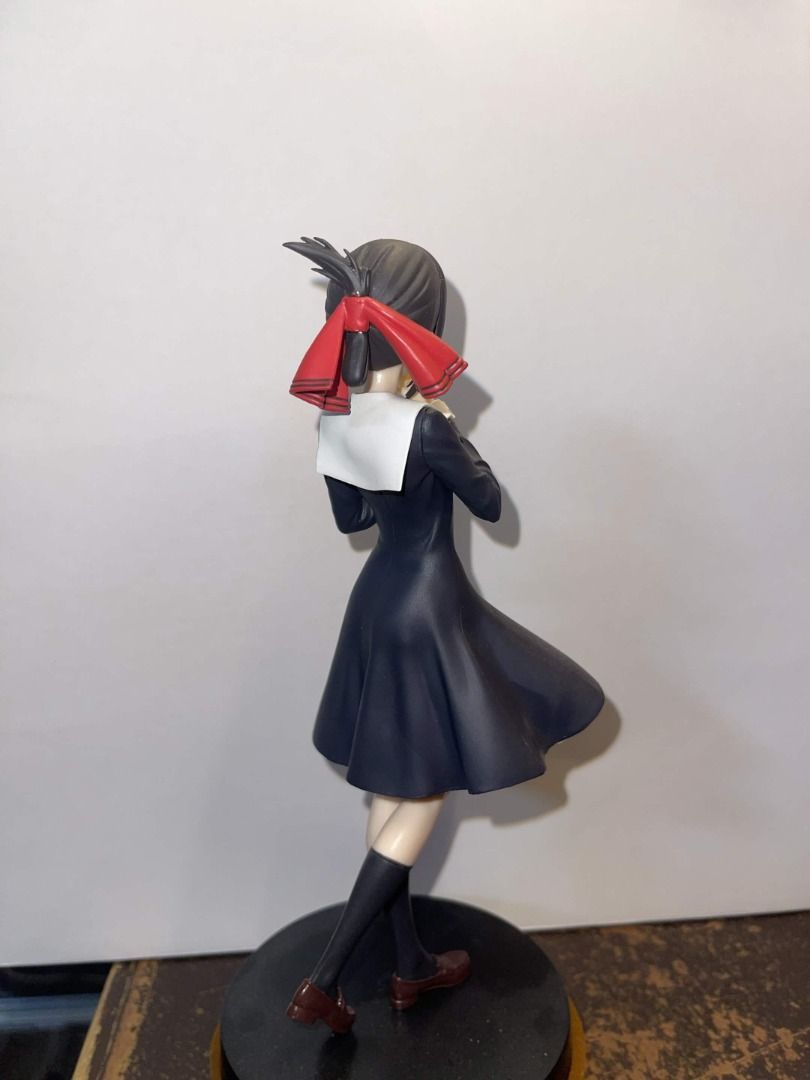 Kaguya-sama: Love is War - Kaguya Shinomiya Figure (Category: Toys & Games) located in Mandaluyong City. Submitted by kathryn.14 (Listing ID 1437657206, Image 2). Description: - Kaguya Shinomiya figure from the anime series. - Dressed in a black school uniform with a white collar and red bow. - Hair styled in a bun with a red ribbon. - Stands on a sleek black base..