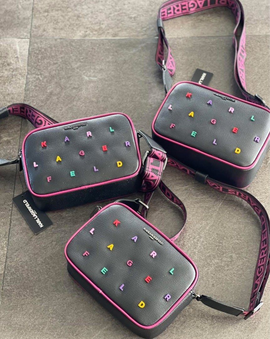Karl Lagerfeld Crossbody Bag (Category: Cross-body Bags) located in Caloocan City. Submitted by Roowchelly (Listing ID 1437695975, Image 1). Description: - Brand new Karl Lagerfeld crossbody bag - Features a sleek black exterior - Accented with vibrant Karl Lagerfeld lettering and pink trim - Comes with a matching pink strap, complete with the Karl Lagerfeld logo - Bag is new and includes original tags.