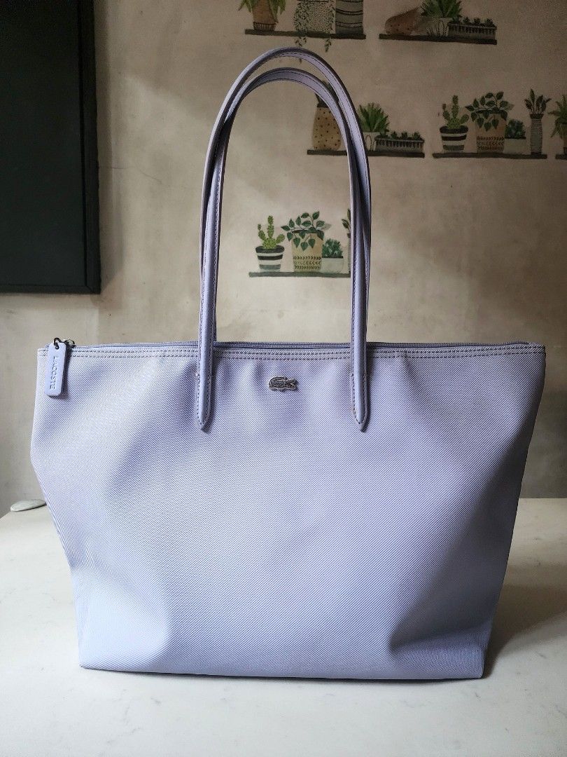 Lacoste Shopping Vertical Tote Bag (Category: Luxury Bags & Wallets) located in Quezon City. Submitted by happycheeeks (Listing ID 1437624232, Image 1). Description: authentic large size tote shoulder bag lavander / periwinkle / in pastel needs cleaning just lowered down fr 3500 thus LAST PRICE not tumi mango h&m zara marc jacobs michael kors uniqlo nike adidas new balance onitsuka Christy ng kate spade.