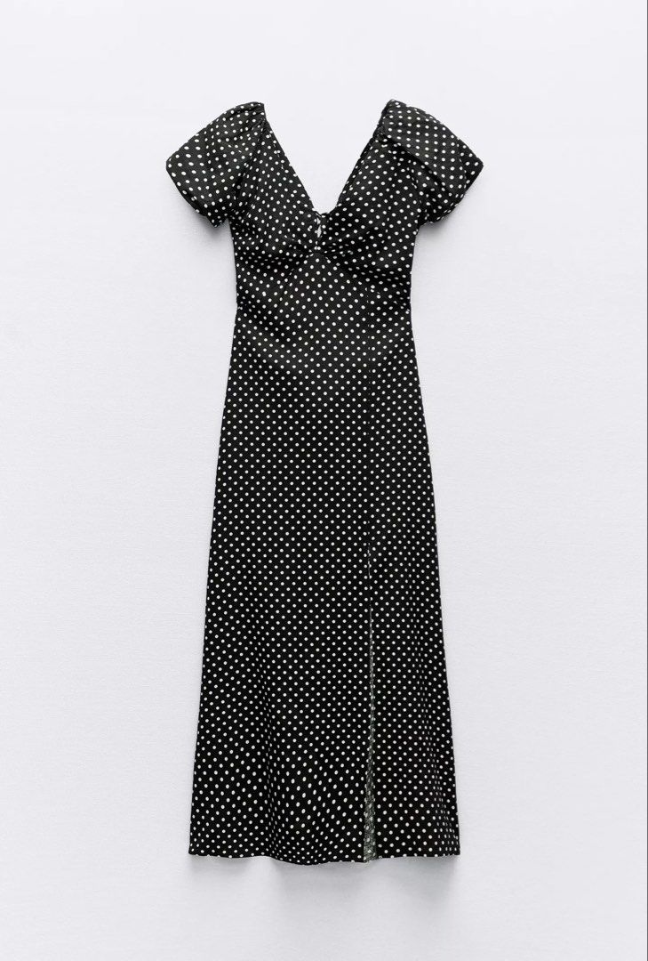 Linen Blend Polka Dot Midi Dress (Category: Dresses) located in Manila. Submitted by cleesells (Listing ID 1437671223, Image 1). Description: - Black midi dress - White polka dots - V-neck - Short sleeves - Front slit - Fitted silhouette - Suitable for casual and semi-formal events.