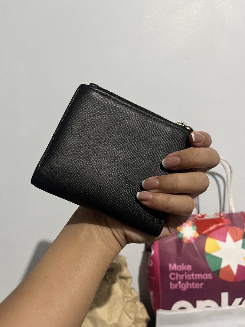Louis Quatorze Black Wallet (Category: Wallets & Card holders) located in Quezon City. Submitted by happyleecorner (Listing ID 1437673758, Image 2). Description: - Black Louis Quatorze wallet - Gold-colored logo - Zipper closure - Multiple compartments - Clear ID slot - Made of leather - Brand: Louis Quatorze.