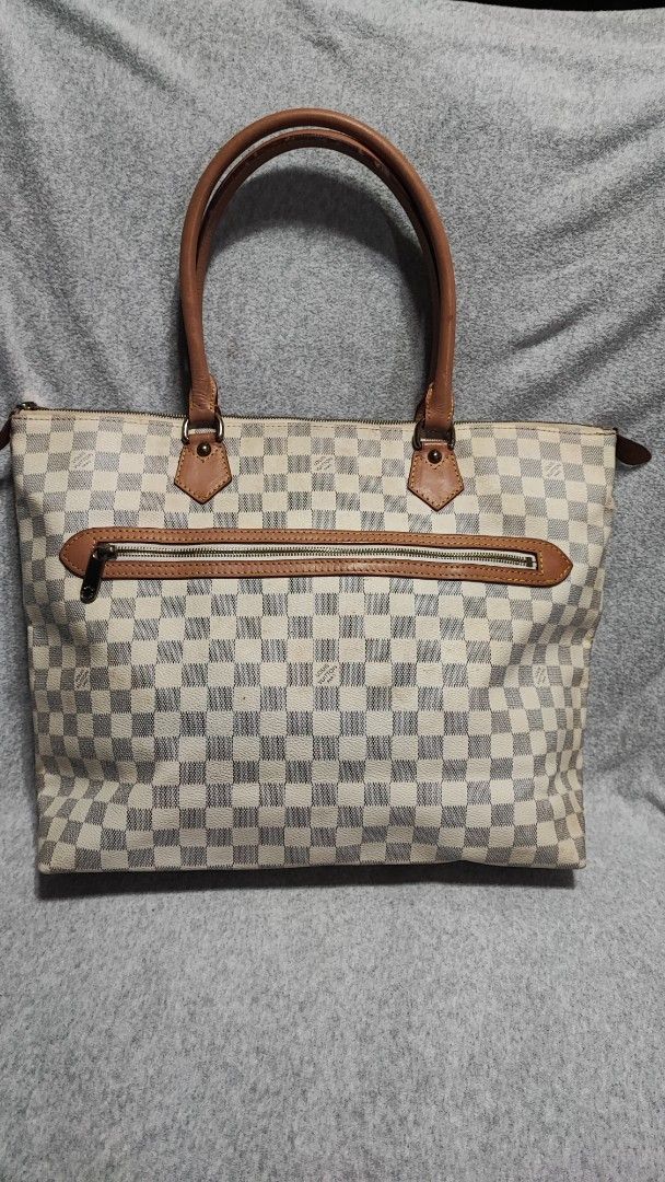 Louis Vuitton Damier Azur Tote Bag (Category: Luxury Bags & Wallets) located in Baguio. Submitted by jayrgijc52758 (Listing ID 1437642264, Image 1). Description: Louis Vuitton Damier Azur Canvas Saleya GM Bag In very good condition 1800.