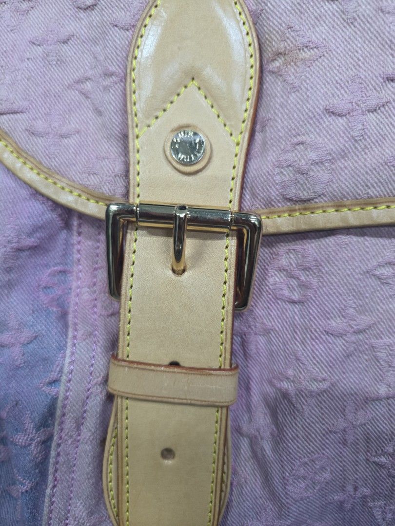 Louis Vuitton Pink Shoulder Bag (Category: Luxury Bags & Wallets) located in General Trias. Submitted by roselle2230 (Listing ID 1437733090, Image 3). Description: - Pink shoulder bag - Monogram pattern - Pink shoulder strap with "LOUIS VUITTON" print - Two leather straps with buckles - Light yellow trim - Flap closure - Made of soft, textured material.