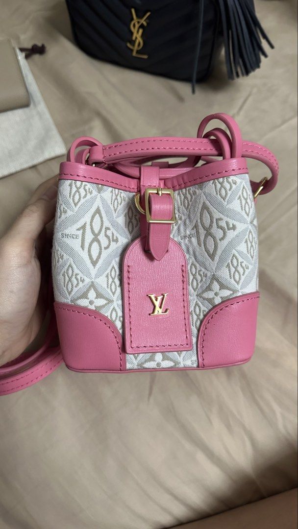Louis Vuitton Since 1854 Mini Bucket Bag (Category: Luxury Bags & Wallets) located in Quezon City. Submitted by mema0522 (Listing ID 1437603717, Image 1). Description: - Louis Vuitton Mini Bucket Bag - Features the "Since 1854" print - Pink leather trim and strap - Includes LV logo tag - Gold-toned hardware - super cute nito and pulido ang stitches - self authenticated! Check all you want before purchase.