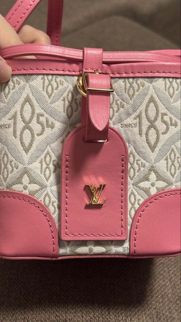 Louis Vuitton Since 1854 Mini Bucket Bag (Category: Luxury Bags & Wallets) located in Quezon City. Submitted by mema0522 (Listing ID 1437603717, Image 3). Description: - Louis Vuitton Mini Bucket Bag - Features the "Since 1854" print - Pink leather trim and strap - Includes LV logo tag - Gold-toned hardware - super cute nito and pulido ang stitches - self authenticated! Check all you want before purchase.