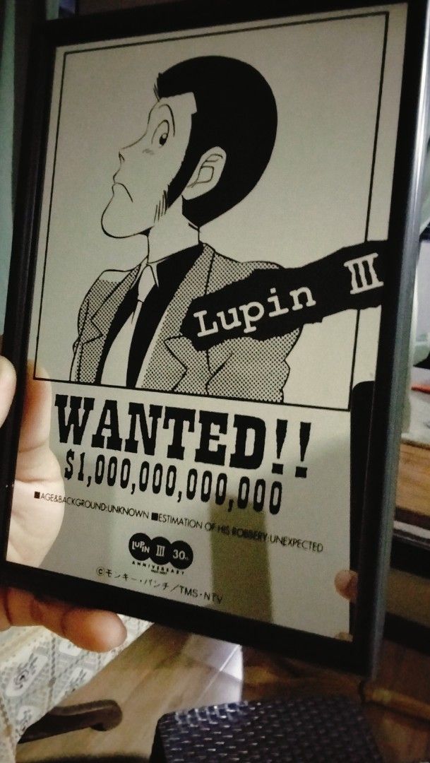 Lupin III Wanted Poster In mirror (Category: Vintage Collectibles) located in Caloocan City. Submitted by chrysan_025 (Listing ID 1437693382, Image 1). Description: - Framed Lupin III Wanted Poster - Features the iconic image of Lupin III - Includes "WANTED!! $1,000,000,000,000" text - Presented in a sleek black frame - A must-have for Lupin III enthusiasts!.
