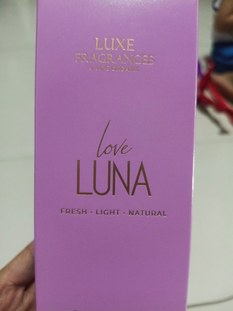Luxe Fragrances Love Luna Perfume (Category: Fragrance & Deodorants) located in Cainta. Submitted by nice_1221 (Listing ID 1437617342, Image 1). Description: - Luxe Fragrances Love Luna perfume - Light purple box and bottle - Unique bottle shape with a clear cap - Fresh, light, and natural fragrance - Gold lettering on the box.