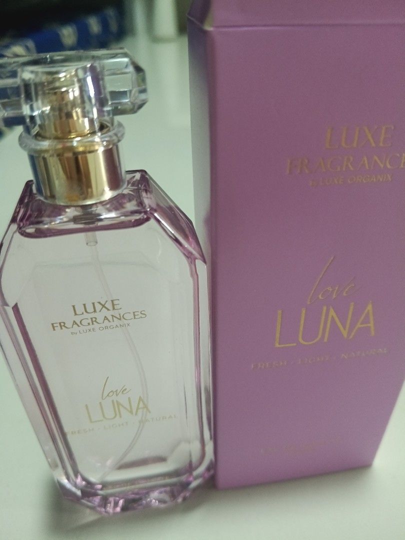 Luxe Fragrances Love Luna Perfume (Category: Fragrance & Deodorants) located in Cainta. Submitted by nice_1221 (Listing ID 1437617342, Image 2). Description: - Luxe Fragrances Love Luna perfume - Light purple box and bottle - Unique bottle shape with a clear cap - Fresh, light, and natural fragrance - Gold lettering on the box.