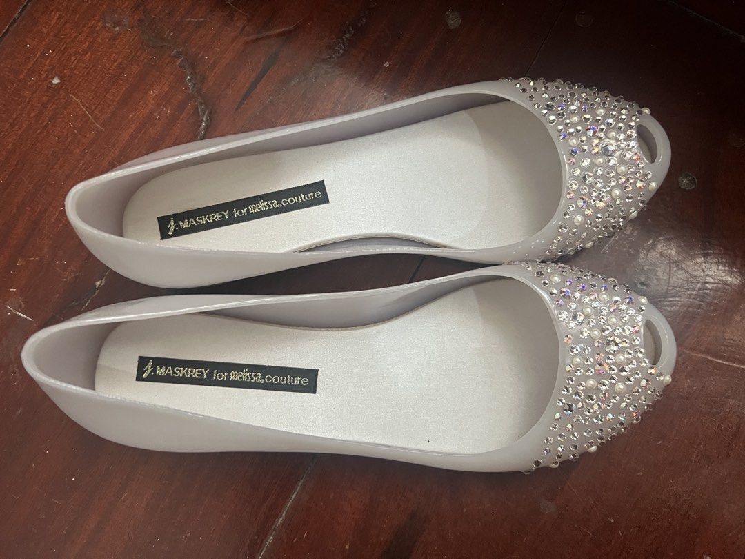 Melissa Wedding Shoes (Category: Flats & Sandals) located in Amadeo. Submitted by mavmadel (Listing ID 1437596146, Image 2). Description: Worn twice during wedding -bought it srp 15K but already discontinued na yung style niya. They are crafted from PVC jelly material and feature intricate Swarovski crystals and pearls on the toe. These are frequently marketed as “Wedding” flats for brides or special occasions.