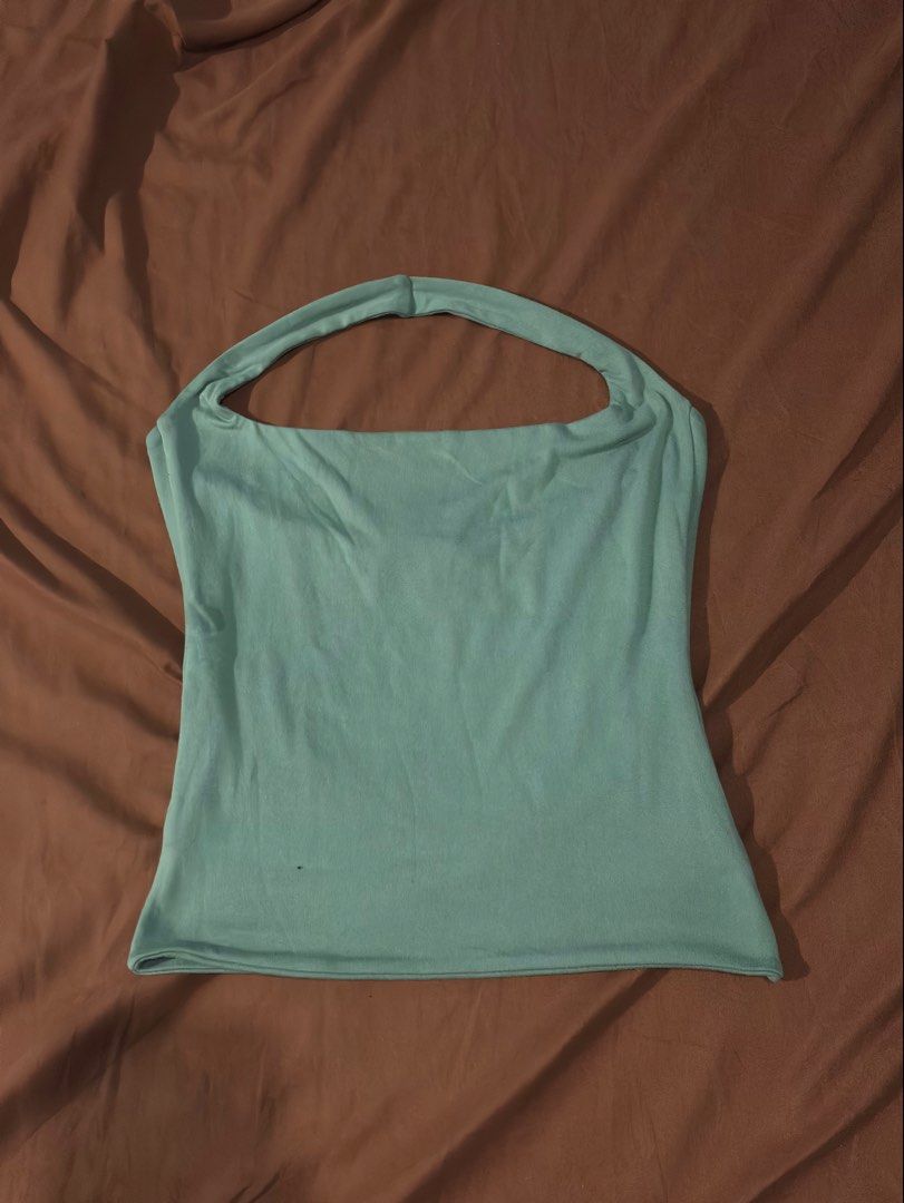 Mera Matilda Sage Green Halter Top (Category: Sleeveless) located in Quezon City. Submitted by _stphnlswardrobe (Listing ID 1437672962, Image 1). Description: Brand: Mera Size: S on tag (really stretchy fabric!!) Condition: Like New MOD: Lalamove, GGX ONLY MOP: GCash, Maya ONLY.