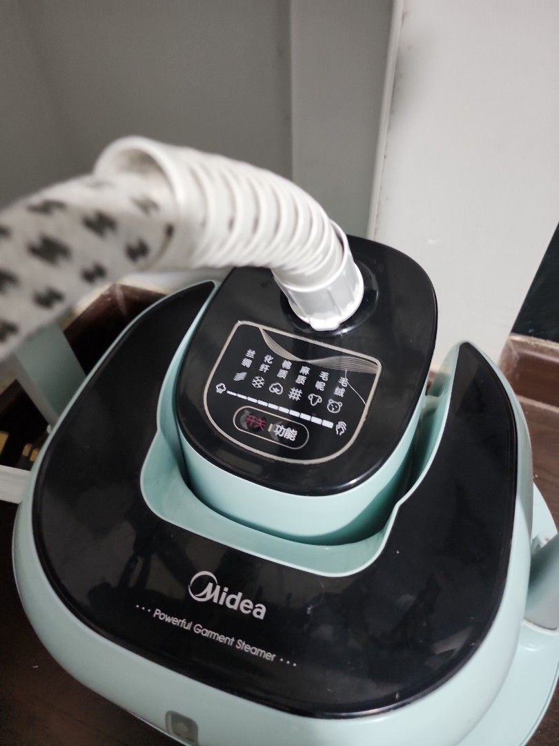 Midea Powerful Garment Steamer (Category: Irons & Steamers) located in Singapore. Submitted by sitiaisha.ali (Listing ID 1437725757, Image 2). Description: - Midea garment steamer - Digital control panel - Includes protective glove and brush attachment - Lightly used and well-maintained - Ready to use.