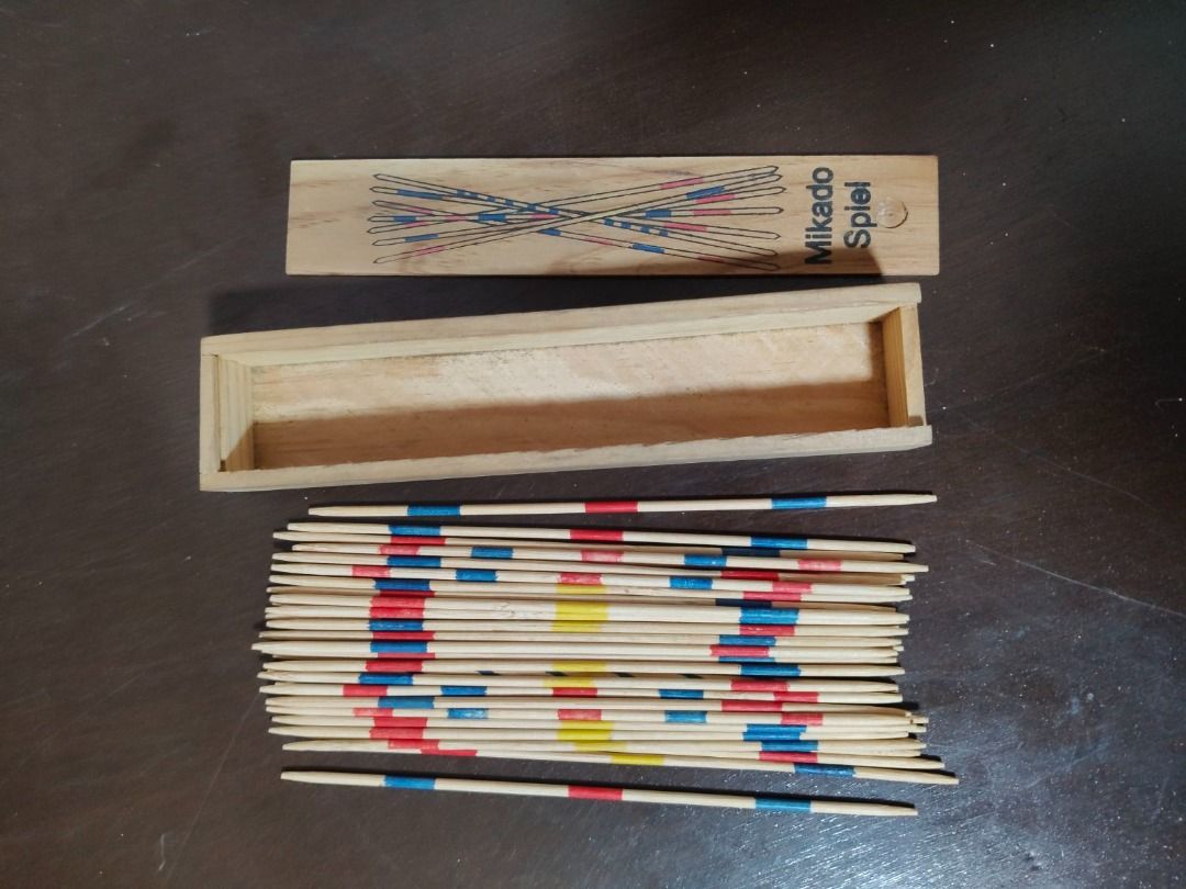 Xmas Discount!!! Mikado Spiel Pick-up Sticks Game (Category: Board Games & Puzzles) located in Quezon City. Submitted by oddduck02 (Listing ID 1437693971, Image 2). Description: - Classic Mikado Spiel Pick-up Sticks game - Comes with a wooden box and sliding lid - Set of 41 wooden sticks with colored markings - Challenge yourself to pick up sticks without disturbing others - Comes with printed instructions - RFS = Cleaning house - Approximate Len