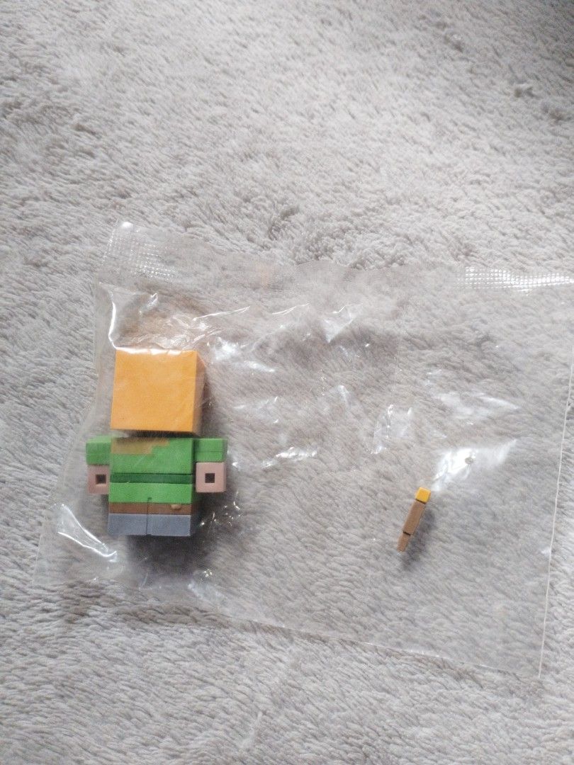 Minecraft Alex Figurine (Category: Figurines & Statues) located in Davao. Submitted by mengsmixitems (Listing ID 1437640803, Image 2). Description: - Minecraft Alex figurine - Brand new, still in original packaging - Includes an accessory.