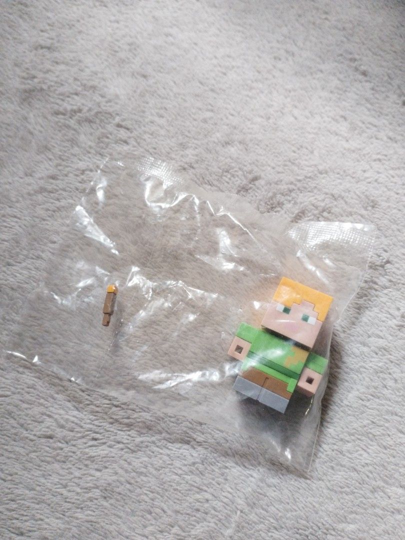 Minecraft Alex Figurine (Category: Figurines & Statues) located in Davao. Submitted by mengsmixitems (Listing ID 1437640803, Image 1). Description: - Minecraft Alex figurine - Brand new, still in original packaging - Includes an accessory.