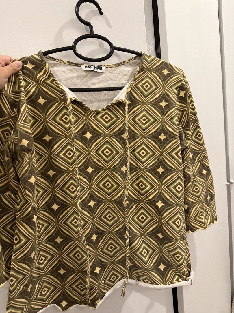 MOVING OUT SALE!! Geometric Print Top (Category: Shirts) located in Paranaque City. Submitted by mandsss21 (Listing ID 1437722040, Image 1). Description: So cute and chic :)) .
