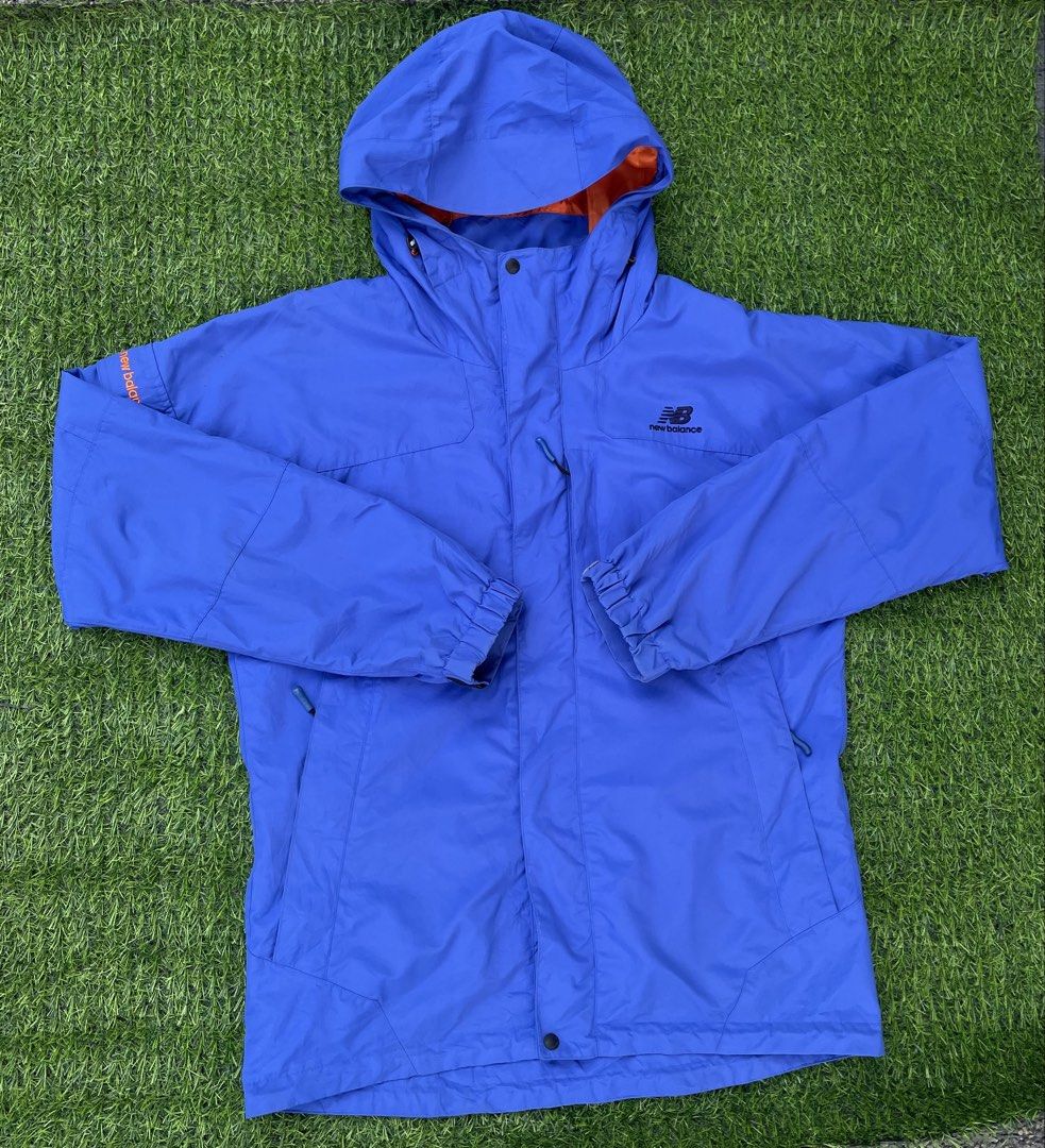 New Balance outdoor windcheater jacket ( Waterproof ) (Category: Coats, Jackets and Outerwear) located in Bacolod City. Submitted by maxpeynthrift (Listing ID 1437588173, Image 2). Description: Width 21 L 28 Can fit to LARGE Excellent condition No issue Brand Detail: Features the distinctive New Balance technical apparel logo stitched on the left chest and a small logo hit on the right upper arm. Weatherproof Design: Built as a technical windbrea
