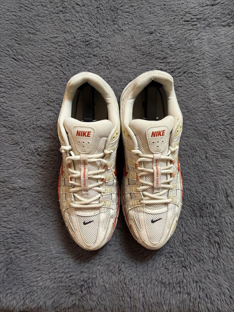 Nike P-6000 Series Sneakers (Category: Sneakers) located in Manila. Submitted by loots_by_d (Listing ID 1437718105, Image 2). Description: - Nike Air Max F-6000 series sneakers - Color: White and red - Features the Nike swoosh logo - Mesh upper - Cushioned sole - Condition: Soles show some wear VOMERO 5 Us 9.5/ Euro 43/ 27.5Cm ✅ Goood Condition ✅ Sign of usage ✅ Authentic ✅ Free Shipping .