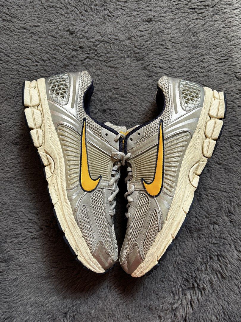 Nike Vomero 5 Sneakers (Category: Sneakers) located in Manila. Submitted by loots_by_d (Listing ID 1437718109, Image 3). Description: - Nike Air Zoom Vomero 5 sneakers - Color: Silver and yellow - Features: Mesh upper, yellow swoosh, cushioned sole VOMERO 5 Us 9.5/ Euro 43/ 27.5Cm ✅ Excellent Condition ✅ Tiny Fixed Mesh ✅ Authentic ✅ Free Shipping .