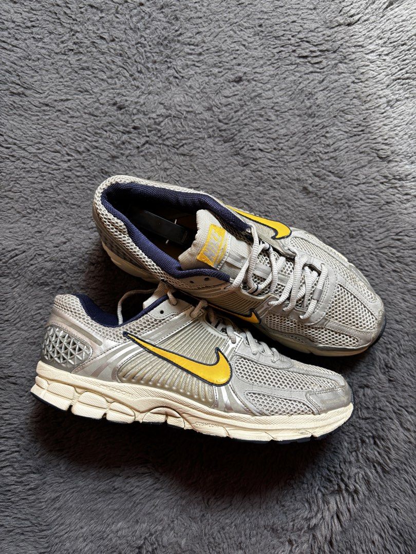 Nike Vomero 5 Sneakers (Category: Sneakers) located in Manila. Submitted by loots_by_d (Listing ID 1437718109, Image 1). Description: - Nike Air Zoom Vomero 5 sneakers - Color: Silver and yellow - Features: Mesh upper, yellow swoosh, cushioned sole VOMERO 5 Us 9.5/ Euro 43/ 27.5Cm ✅ Excellent Condition ✅ Tiny Fixed Mesh ✅ Authentic ✅ Free Shipping .