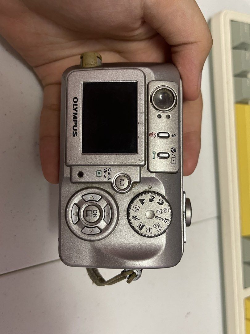 Olympus C-50 Digital Camera (Category: Cameras) located in Tarlac. Submitted by tatumrica26185 (Listing ID 1437677965, Image 2). Description: - Working - no xd card you need to buy online - sira yung sa front slide nya pero working naman usable sya (message me on how to work or i can send u a video of the cam) - it comes with a brand new battery - no issue at all wala lang syang slide sa harap but it doesn't matter it still works - Made in Japan.