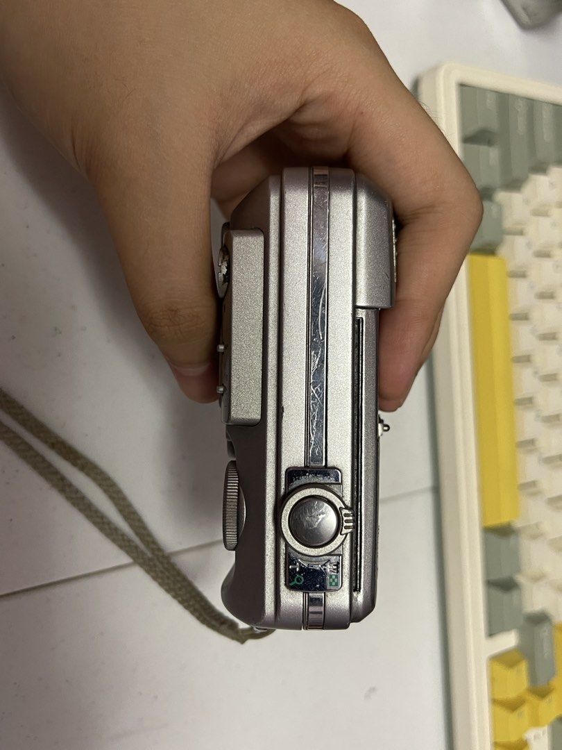 Olympus C-50 Digital Camera (Category: Cameras) located in Tarlac. Submitted by tatumrica26185 (Listing ID 1437677965, Image 3). Description: - Working - no xd card you need to buy online - sira yung sa front slide nya pero working naman usable sya (message me on how to work or i can send u a video of the cam) - it comes with a brand new battery - no issue at all wala lang syang slide sa harap but it doesn't matter it still works - Made in Japan.