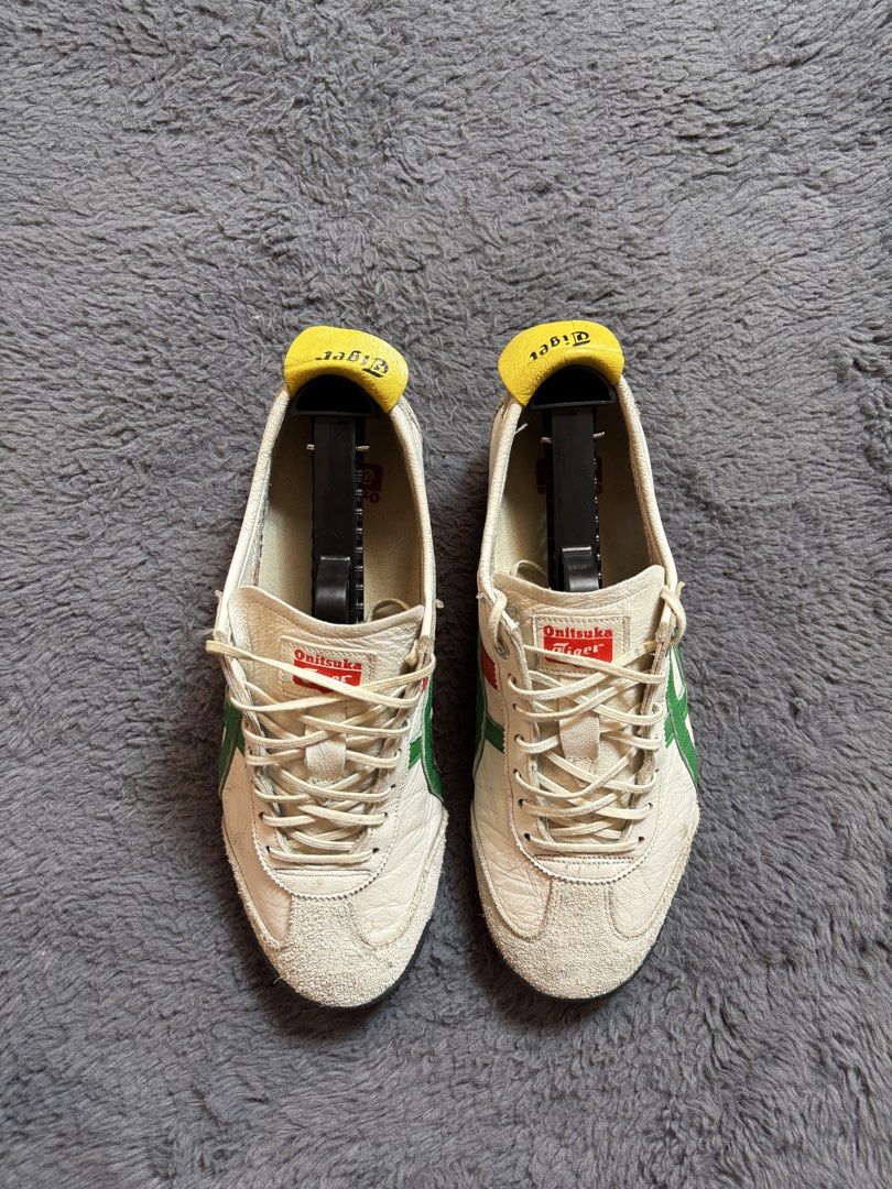 Onitsuka Tiger Mexico 66 Sneakers (Category: Sneakers) located in Manila. Submitted by loots_by_d (Listing ID 1437718107, Image 2). Description: - Onitsuka Tiger Mexico 66 sneakers - White with green and red stripes - White sole with black toe cap - Yellow tongue and heel tab - Lace-up closure - Visible Onitsuka Tiger logo - Soles show some wear ✅ Excellent Condition ✅ No issue ✅ Minor sign of use ✅ Free Shipping.