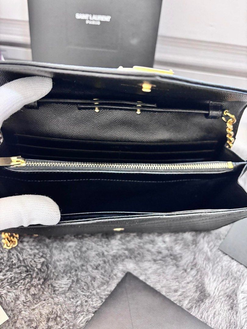 Original YSL Cassandre Envelope Chain Wallet WOC in Large Grained Leather (Category: Luxury Bags & Wallets) located in Manila. Submitted by shopwithbrilliantadel (Listing ID 1437749944, Image 3). Description: Good Condition Guaranteed authentic or your money back Complete Set with Receipt, no paperbag With authenticity certificate from Koibito Korea .
