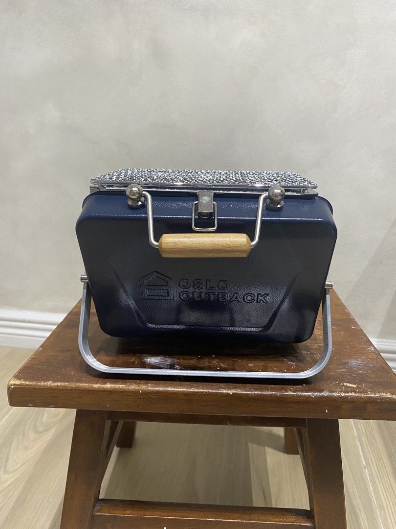 Oslo Outback Portable Charcoal Grill (Category: BBQ, Grills & Hotpots) located in Manila. Submitted by papupeeps (Listing ID 1437631578, Image 2). Description: Ultra-Portable Design: Features a lightweight, foldable “lunchbox” aesthetic with a wooden handle for easy transport. Durable Build: Constructed from high-quality stainless steel for heat and rust resistance. Quick Setup: Simple assembly that typically takes less than a minute to go from p