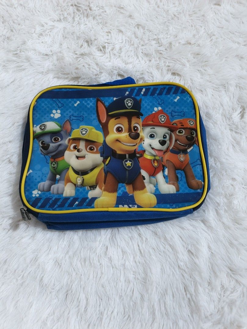 Paw Patrol Lunch Bag (Category: Other Babies Going Out Needs) located in Marikina City. Submitted by andreah_16 (Listing ID 1437610746, Image 1). Description: - Paw Patrol lunch bag - Features a vibrant Paw Patrol design - Blue exterior with yellow trim - Convenient handle for carrying - Insulated interior to keep food fresh - Official Nickelodeon product (2018) - Made in China.