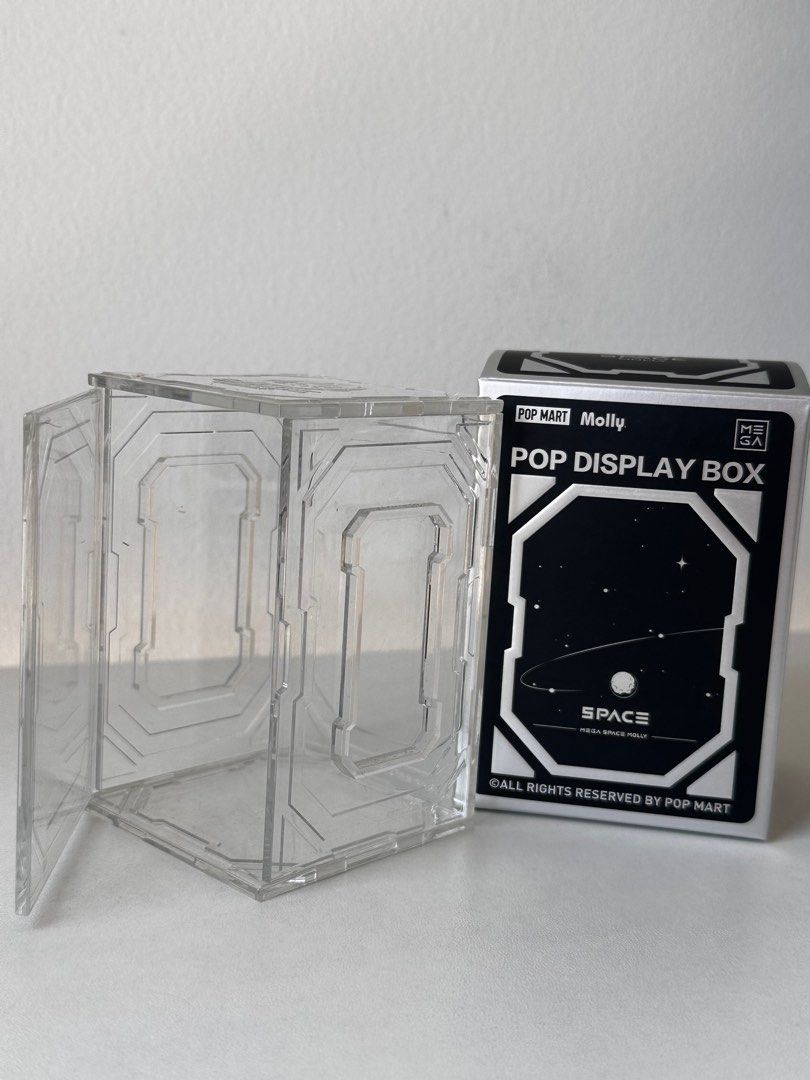 Pop Mart Molly Display Box (Category: Designer & Blind Box Toys) located in Manila. Submitted by 2ndstory04 (Listing ID 1437593023, Image 2). Description: - Pop Mart Molly Pop Display Box - Clear, protective case - Designed for Molly figures - Comes with original packaging - Ideal for collectors - Preserves and showcases your collectibles -6pcs available, 200 each -Bought at PopMart in Osaka Japan.
