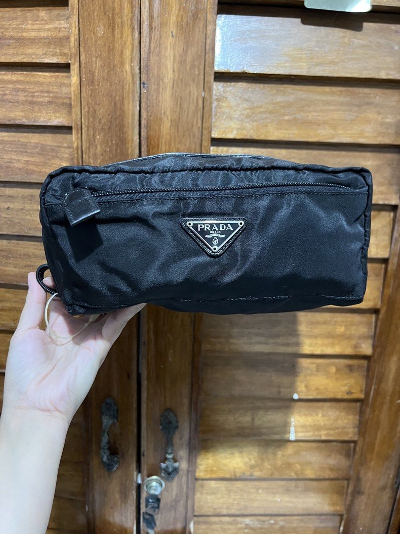 Prada Clutch (Category: Luxury Bags & Wallets) located in Tacloban City. Submitted by classy_luxury (Listing ID 1437682790, Image 1). Description: Prada clutch Authentic No flaws .