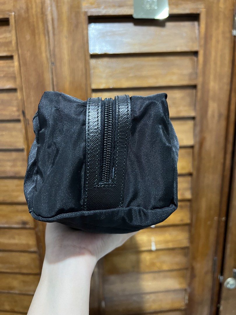 Prada Clutch (Category: Luxury Bags & Wallets) located in Tacloban City. Submitted by classy_luxury (Listing ID 1437682790, Image 2). Description: Prada clutch Authentic No flaws .