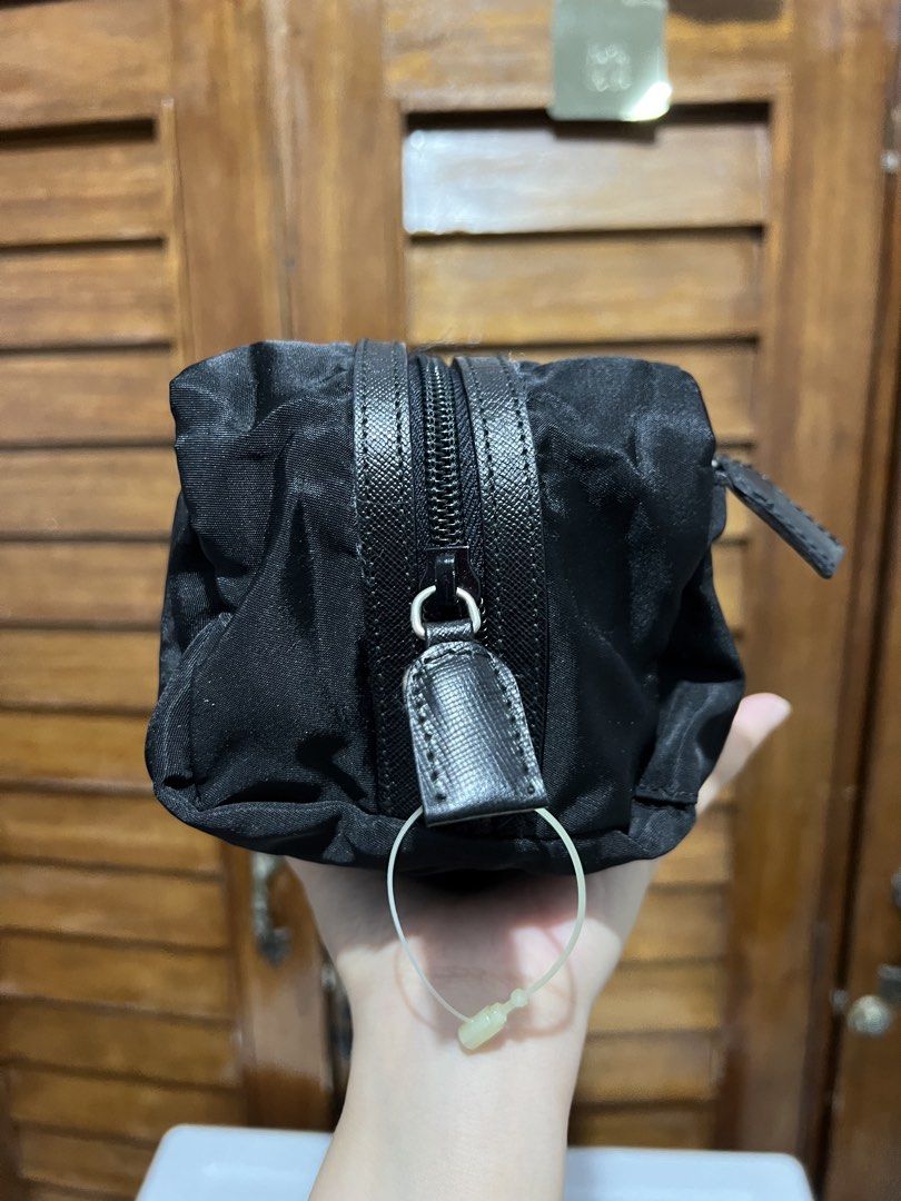 Prada Clutch (Category: Luxury Bags & Wallets) located in Tacloban City. Submitted by classy_luxury (Listing ID 1437682790, Image 3). Description: Prada clutch Authentic No flaws .