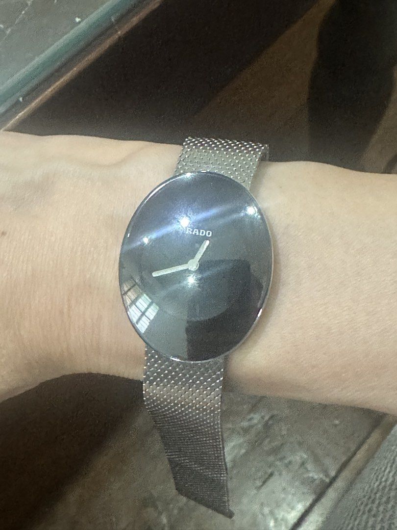 Rado Esenza Oval Watch with Mesh Strap (Category: Women's Watches) located in Manila. Submitted by roseluxuryitems (Listing ID 1437618405, Image 1). Description: - Rado watch with a sleek design. - Features an oval black dial. - Stainless steel mesh strap. - Silver hands and Rado logo. - Perfect for any occasion..