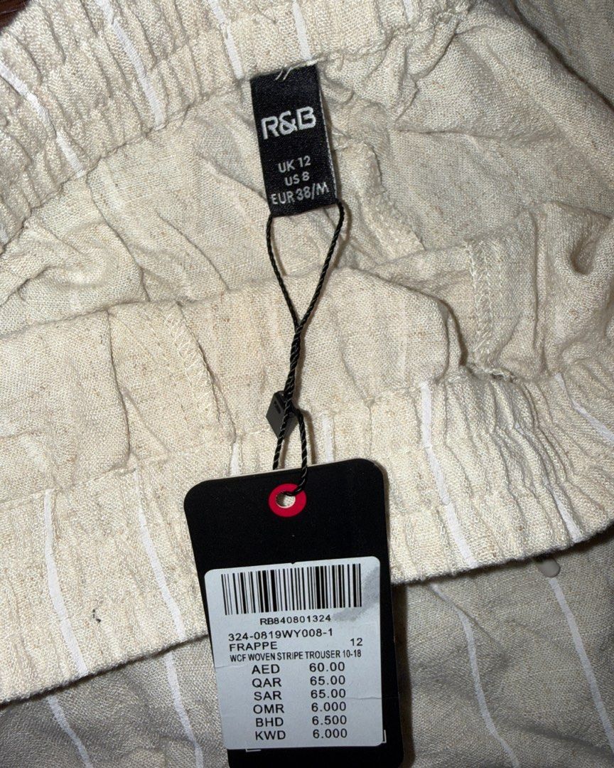 R&B Stripe Trousers with tag (Category: Other Bottoms) located in Manila. Submitted by autolck (Listing ID 1437609129, Image 2). Description: - Beige color with vertical white stripes - Elastic waistband - Size: UK 12, EUR 38/M, 29.4 (W), 43 (L), Leg Opening 13” - Condition: 10/10 - Can nego loc: las piñas mop: bank , gcash mod: lalamove ( shouldered by buyer ) .