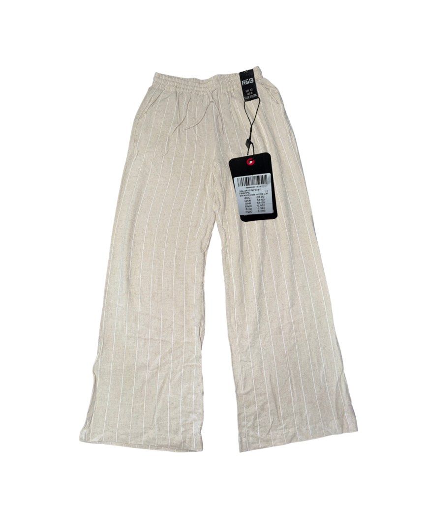 R&B Stripe Trousers with tag (Category: Other Bottoms) located in Manila. Submitted by autolck (Listing ID 1437609129, Image 1). Description: - Beige color with vertical white stripes - Elastic waistband - Size: UK 12, EUR 38/M, 29.4 (W), 43 (L), Leg Opening 13” - Condition: 10/10 - Can nego loc: las piñas mop: bank , gcash mod: lalamove ( shouldered by buyer ) .
