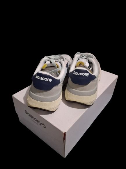 Saucony Jazz NXT Sneakers (Category: Sneakers) located in Imus. Submitted by zealdog.725f0a (Listing ID 1437756812, Image 3). Description: - Saucony Jazz NXT sneakers - Color: Navy, White, Grey - Size: US 8.5 / EUR 42 - Includes original box - Saucony logo detail - Lace-up closure.