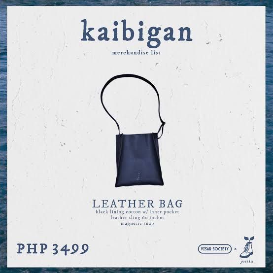 SB19 justin - Kaibigan Leather Bag (Category: Shoulder Bags) located in Quezon City. Submitted by amillionsuns (Listing ID 1437608413, Image 3). Description: - Kaibigan leather bag - Navy blue color - Black cotton lining - Inner pocket - 60-inch leather sling - Magnetic snap closure - Small logo on the front - Brand New (part of my collection).