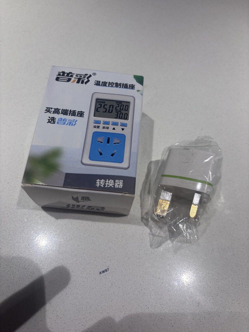 Smart Socket Automatic Power-off Timer Switch (Category: Electrical, Adaptors & Sockets) located in Singapore. Submitted by jvlll (Listing ID 1436468580, Image 8). Description: Smart socket features 16-group cycle switches and a 2500W capacity. It can be used for various appliances, including electric vehicle chargers and water heaters. It also has a temperature control range of -10 to 120 degrees, with four probe options, a buzzer alarm, power-o