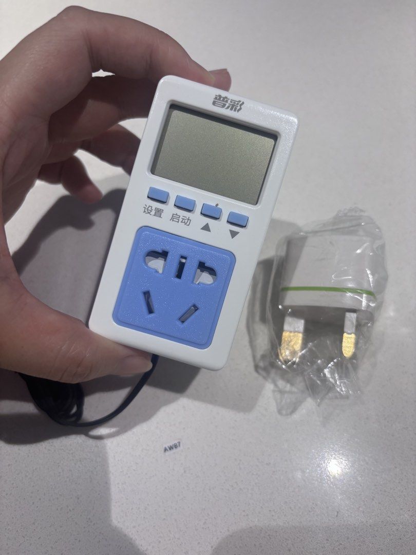 Smart Socket Automatic Power-off Timer Switch (Category: Electrical, Adaptors & Sockets) located in Singapore. Submitted by jvlll (Listing ID 1436468580, Image 5). Description: Smart socket features 16-group cycle switches and a 2500W capacity. It can be used for various appliances, including electric vehicle chargers and water heaters. It also has a temperature control range of -10 to 120 degrees, with four probe options, a buzzer alarm, power-o