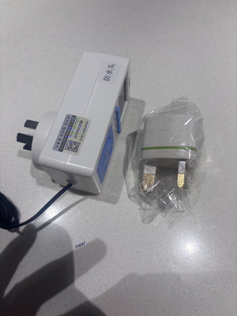Smart Socket Automatic Power-off Timer Switch (Category: Electrical, Adaptors & Sockets) located in Singapore. Submitted by jvlll (Listing ID 1436468580, Image 6). Description: Smart socket features 16-group cycle switches and a 2500W capacity. It can be used for various appliances, including electric vehicle chargers and water heaters. It also has a temperature control range of -10 to 120 degrees, with four probe options, a buzzer alarm, power-o