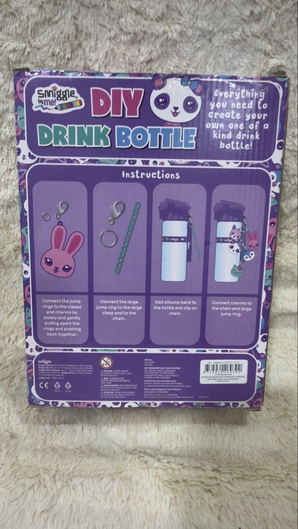 Smiggle DIY Drink Bottle (Category: Water Bottles & Tumblers) located in Lucena. Submitted by bagafficionados (Listing ID 1437715904, Image 2). Description: This is a Smiggle Funky DIY Drink Bottle set in purple.This kit includes a 600ml BPA-free water bottle.It comes with colored charms, a silicone band, a colored chain, and clasps/rings for decoration.The set is designed for children aged 6 and older to personalize their own water bottle..