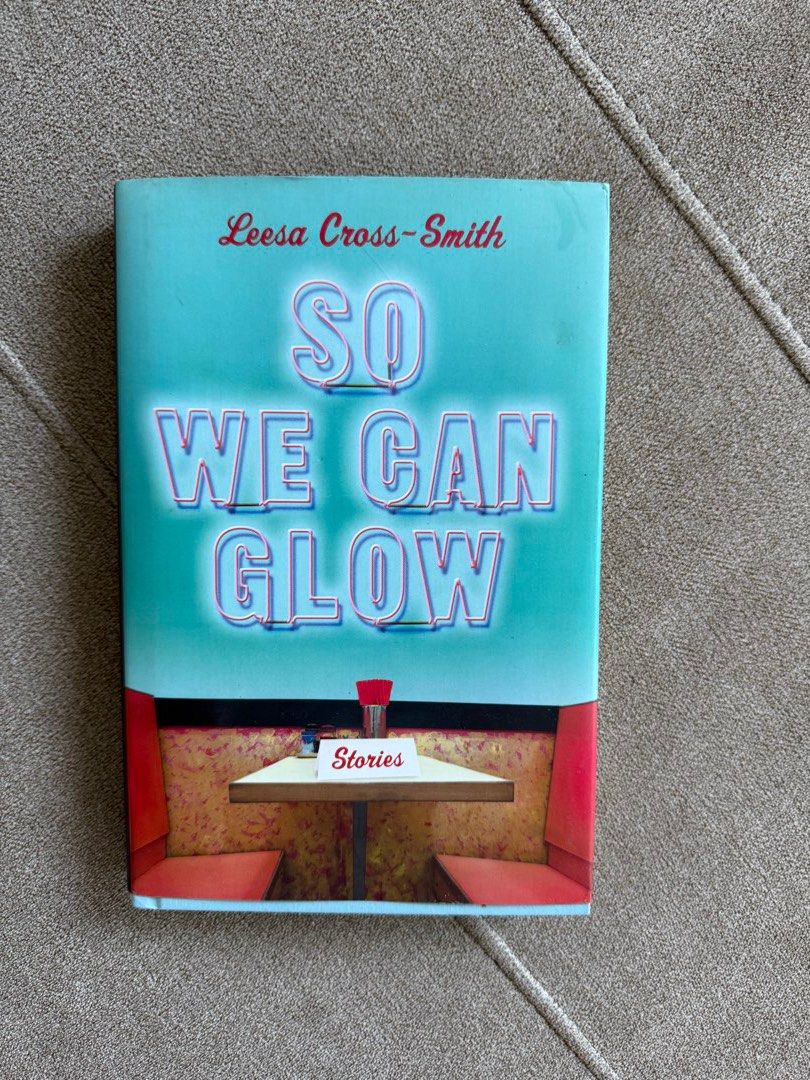 So We Can Glow by Leesa Cross-Smith (Category: Storybooks) located in Davao. Submitted by friesflakes (Listing ID 1437654940, Image 1). Description: - Title: So We Can Glow - Author: Leesa Cross-Smith - Format: Paperback - Cover: Teal background with bold, neon-style lettering - Back: Includes author praise and book description.