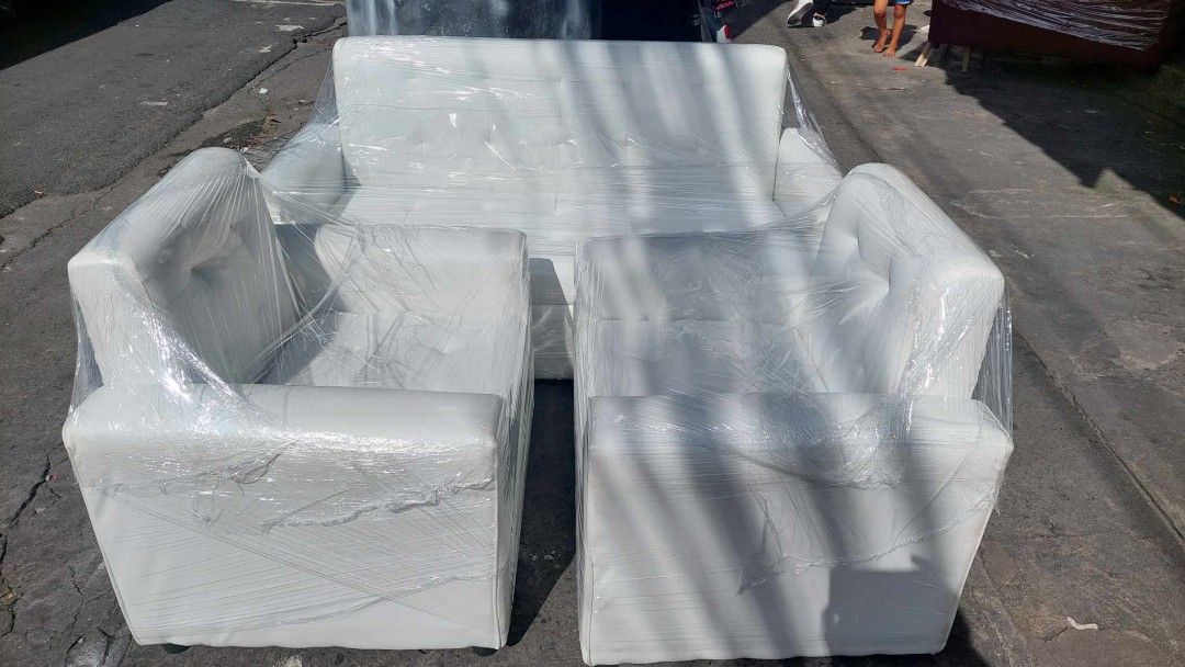 Sofa Set - 3 Seater and 2 Single Chairs (Category: Sofas) located in Manila. Submitted by jerrymieborda05 (Listing ID 1437746867, Image 2). Description: - Complete sofa set (3-seater + 2 single chairs) - Classic and comfortable design - Ideal for living rooms - Wrapped in protective plastic.