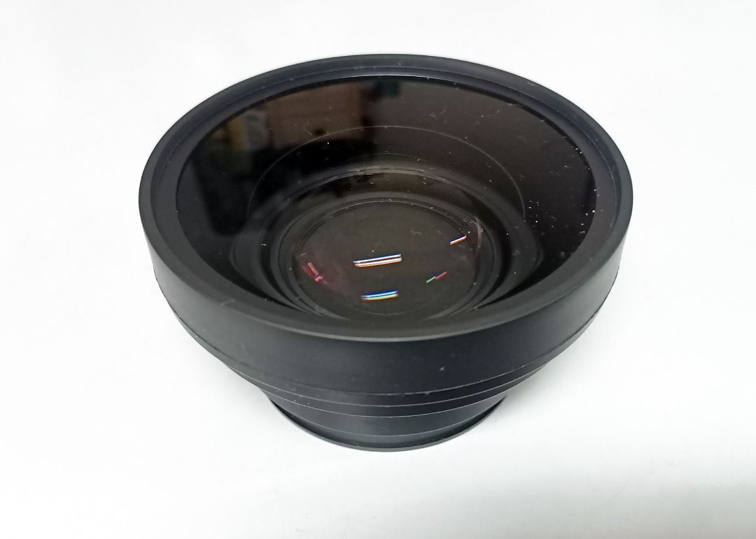 SONY WIDE LENS FOR DCR-VX2000 CAMERA WITH POUCH Pouch (Category: Video Cameras) located in Pasig City. Submitted by prosmmad (Listing ID 1437643464, Image 3). Description: - Sony Wide Lens for Digital Handycam DCR-VX2000 - Includes lens cap with Sony Logo - Comes with a protective drawstring pouch - Sleek black design.