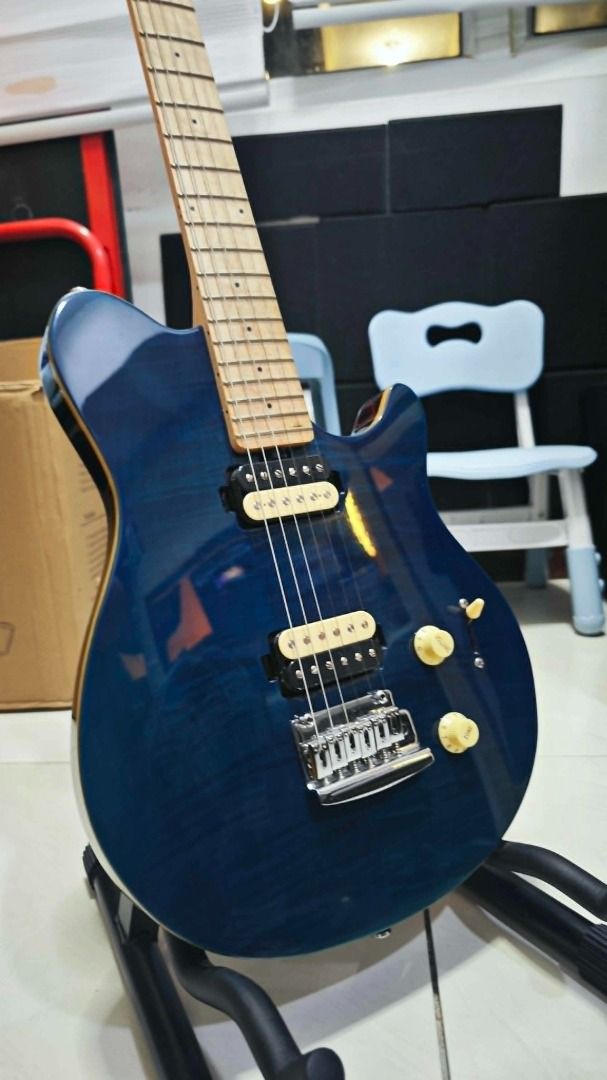 Sterling AX3FM Electric Guitar – Excellent Condition | Complete Set (Category: Musical Instruments) located in Manila. Submitted by echoesofpraise (Listing ID 1437726276, Image 3). Description: Selling my Sterling AX3FM electric guitar in excellent condition. This is a modern, punchy guitar with a comfortable neck and solid hardware. 🔧 Specs Model: Sterling AX3FM Strings: 6-string Scale length: 25.5” Body: Mahogany with flamed maple top Neck: Ma