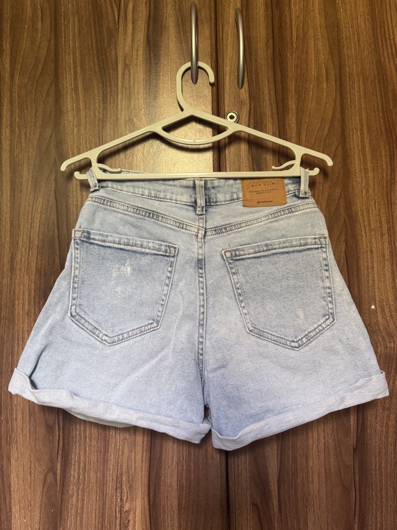 Stradivarius Mom Slim Denim Shorts (Category: Shorts) located in Angono. Submitted by gentlyadoredstuff (Listing ID 1437659446, Image 2). Description: - Stradivarius denim shorts - Light blue wash - High-waisted - Mom slim fit - Size: EUR 34, USA 02, MEX 24, UK 06 - Button closure - Classic five-pocket design - Rolled-up cuffs - Made in Bangladesh.